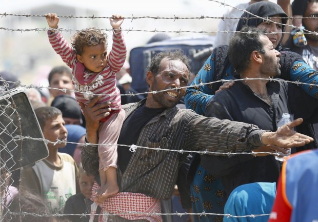 ISIS deține 227 de creștini asirieni ca ostatici, iar lumea privește genocidul ca o curățare etno-religioasă în Orientul Mijlociu, spune un asistent social